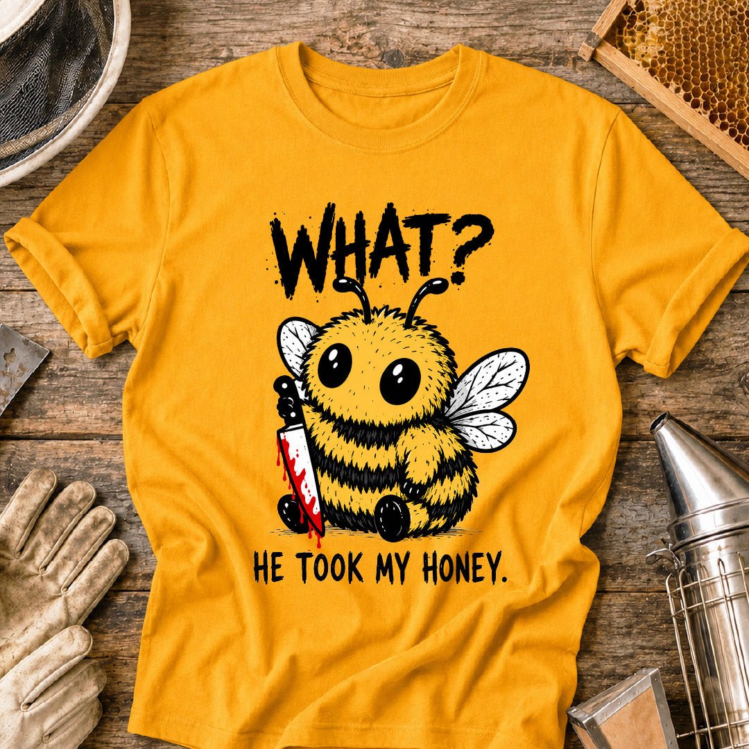 Funny beekeeper shirt design featuring a cute fluffy honey bee holding a bloody knife with the phrase “What? He Took My Honey,” a dark humor bee graphic for beekeepers and bee lovers.