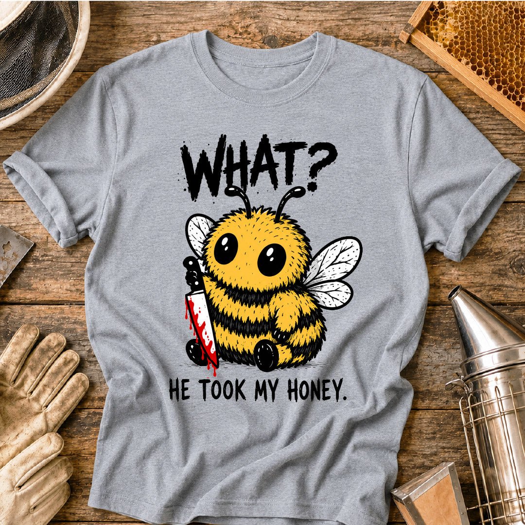 Funny beekeeper shirt design featuring a cute fluffy honey bee holding a bloody knife with the phrase “What? He Took My Honey,” a dark humor bee graphic for beekeepers and bee lovers.